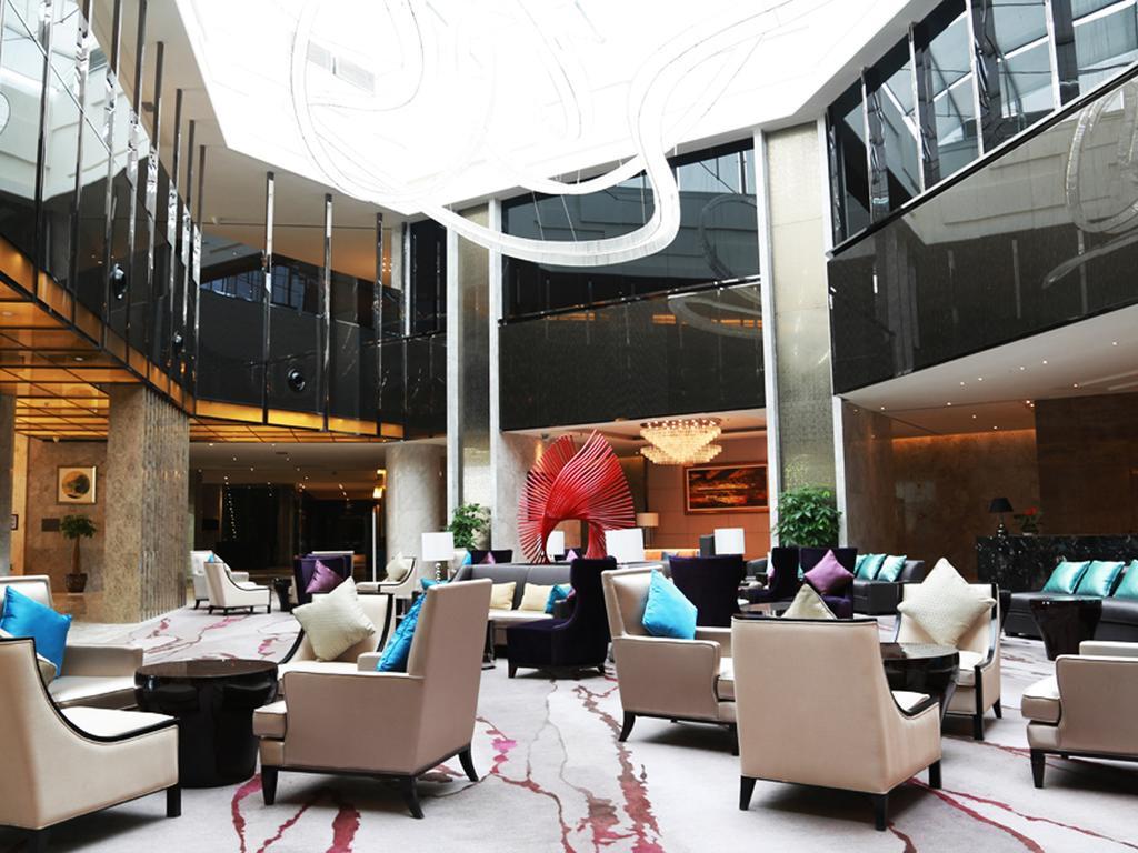 Отель Ramada Plaza Liuzhou Liudong Экстерьер фото